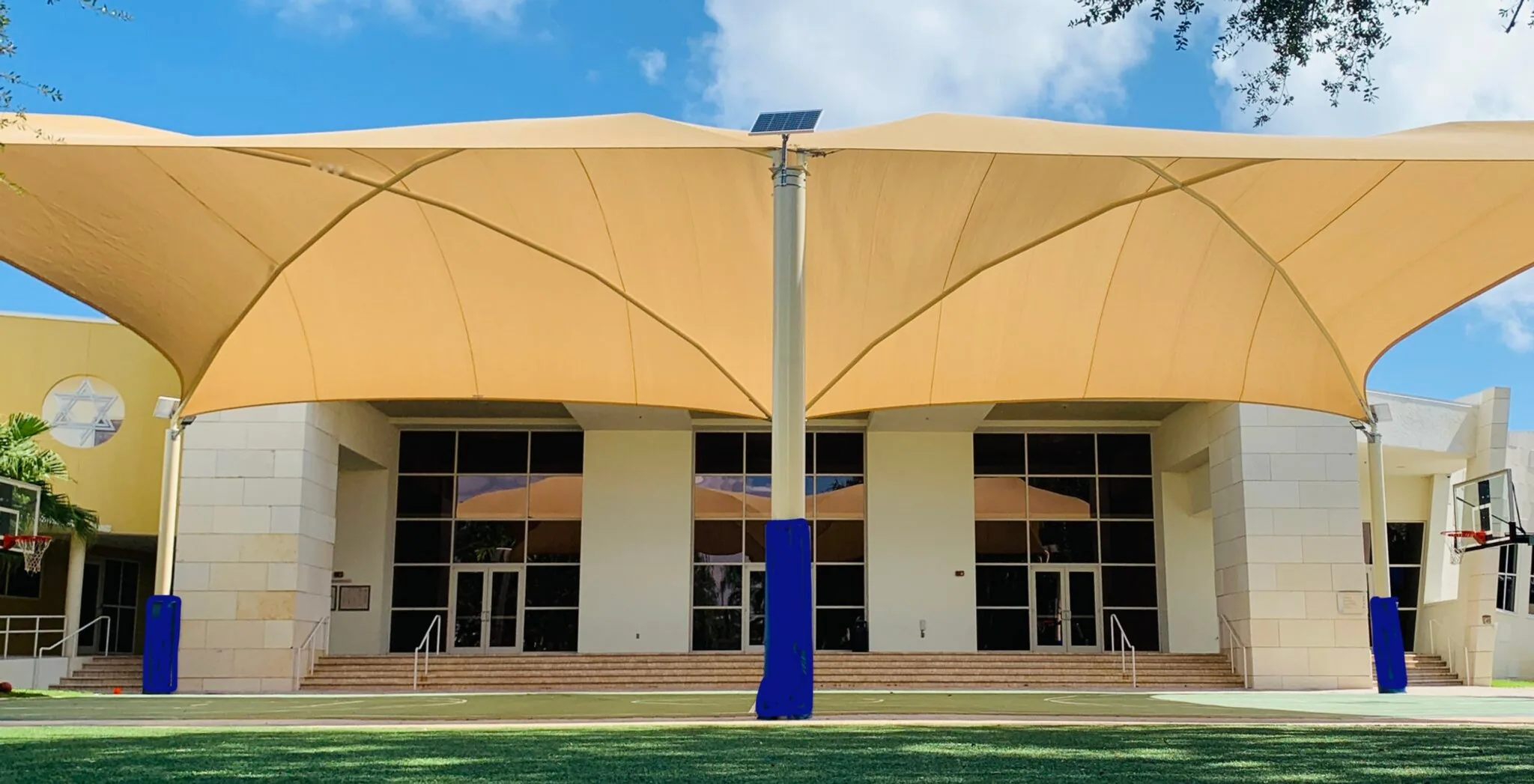 Steel shade canopy enhancing a modern commercial property
